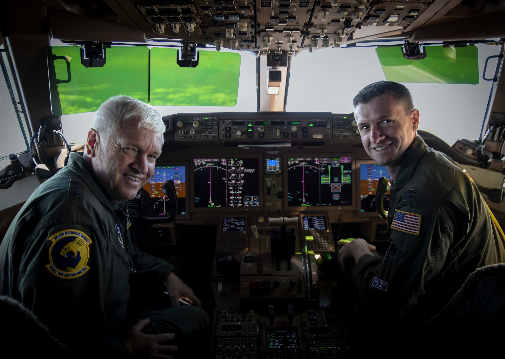U.S. Air Force Lt. Gen. L. Scott Rice, left, director of the Air National Guard, and U.S. Air Force Capt. Lee
Rice, right, a pilot assigned to the 157th Air Refueling Wing, Pease Air National Guard Base, New
Hampshire, fly a KC-46A Pegasus Aug. 8, 2019. This KC-46 flight started at the Boeing Delivery Center in
Seattle, Wash., and ended at the aircraft’s newly assigned home station at the 157th ARW. (U.S. Air
National Guard photo by Staff Sgt. Morgan R. Lipinski)