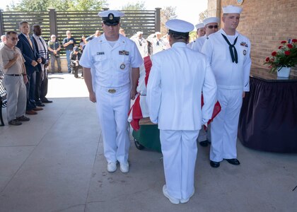 Navy Recruiting District San Antonio Sailors act as pallbearers for Petty Officer 3rd Class Mark Lyle Walker, a sonar technician (submarine), Sept. 26 in Killeen, Texas. Walker, a submarine veteran, had no family or next of kin, prompting the Navy Medicine Education, Training and Logistics Command, Navy Medicine Training Support Center and NRD-SA Sailors to make the two-hour drive from Joint Base San Antonio to honor Walker's Navy service.
