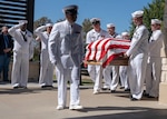 Navy Recruiting District San Antonio Sailors carry the casket for Petty Officer 3rd Class Mark Lyle Walker, a sonar technician (submarine), in Killeen, Texas, Sept. 26 . Walker, a submarine veteran, had no family or next of kin, prompting the Navy Medicine Education, Training and Logistics Command, Navy Medicine Training Support Center and NRD-SA Sailors to make the two-hour drive from Joint Base San Antonio to honor Walker's Navy service.