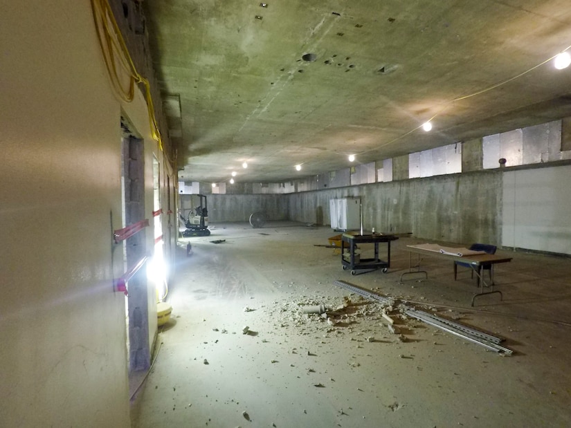 Contractors working for the Norfolk District, U.S. Army Corps of Engineers, perform interior renovation work to the Arlington National Cemetery’s administrative building here June 21, 2019.