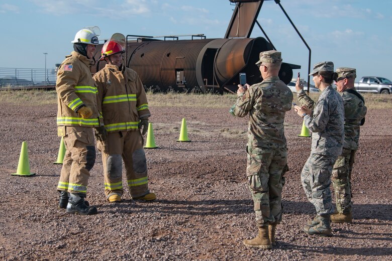 The team for the 97th Civil Engineer Squadron pose for a photo