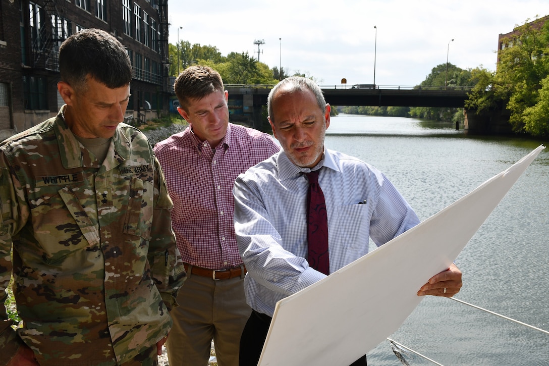 Mike Padilla (right), U.S. Army Corps of Engineers Chicago District project manager, speaks to Maj. Gen. Robert F. Whittle, Jr., commanding general of the USACE Great Lakes and Ohio River Division, about Bubbly Creek in Chicago Sept. 25. Joseph Savage (center), the division’s regional business director, looks on. The general took time to visit the districts within the division and meet USACE employees since taking command in July. The general’s tour of Chicago District projects, potential projects and sites included Indiana Harbor and Canal confined disposal facility, Bubbly Creek in Chicago, the Asian-Carp electric dispersal barrier, the Metropolitan Water Reclamation District of Greater Chicago’s mainstream pumping station, the McCook Reservoir phase one and two, Northerly Island in Chicago, the Chicago Harbor and Lock, and the Department of Veterans Affairs Hospital in Hines, Illinois. (U.S. Army photo by Patrick Bray/Released)