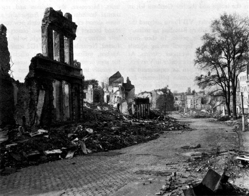A street view of buildings in ruins.