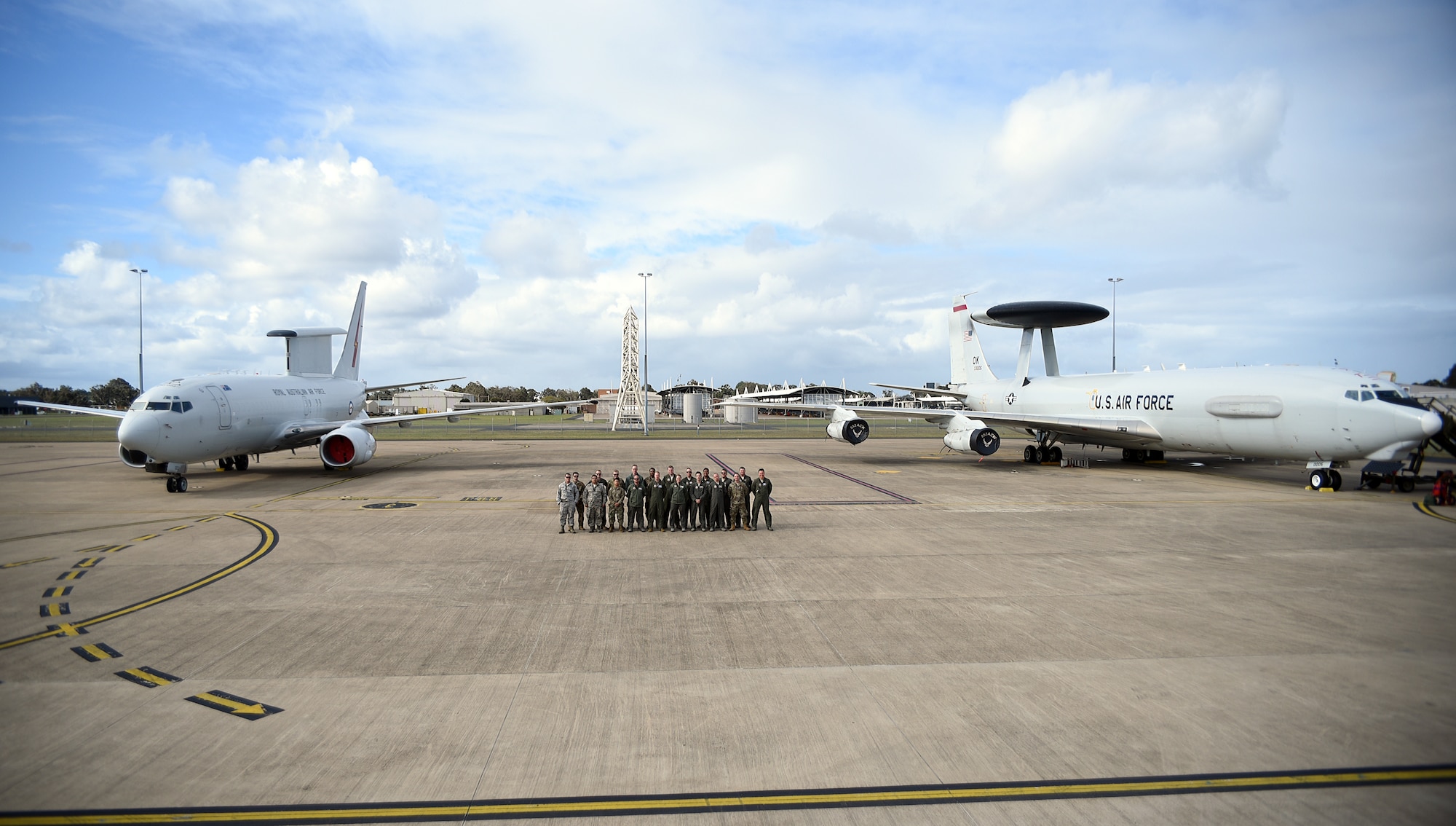 An E-3G Airborne Warning and Control System aircraft of the 552nd Air Control Wing, 960th Airborne Air Control Squadron, joins the Royal Australian Air Force E-7A Airborne Early Warning and Control aircraft in September 2019, Williamtown, Australia. The AWACS joined the RAAF to work on mission integration and partnership of similar airframes in response to the E-7A AEWC visiting the 552nd ACW in 2017. (U.S. Air Force photo/2d Lt Ashlyn K. Paulson)