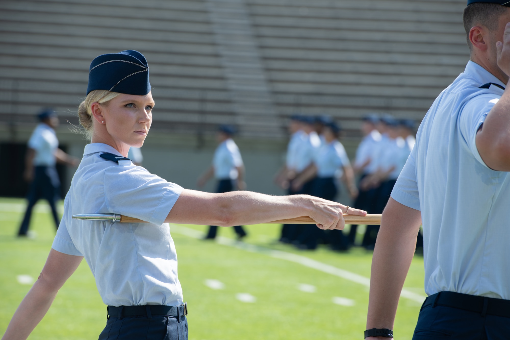 A newly commissioned officer a part of the Air Force’s Officer Training School class 19-07 participates in the graduation ceremony Sept. 27, 2019, in Montgomery, Alabama. Officer Training School’s class 19-07, also known as “Godzilla Class,” spent the last eight weeks taking part in a series of field training and classroom leadership exercises preparing them to become Air Force officers.