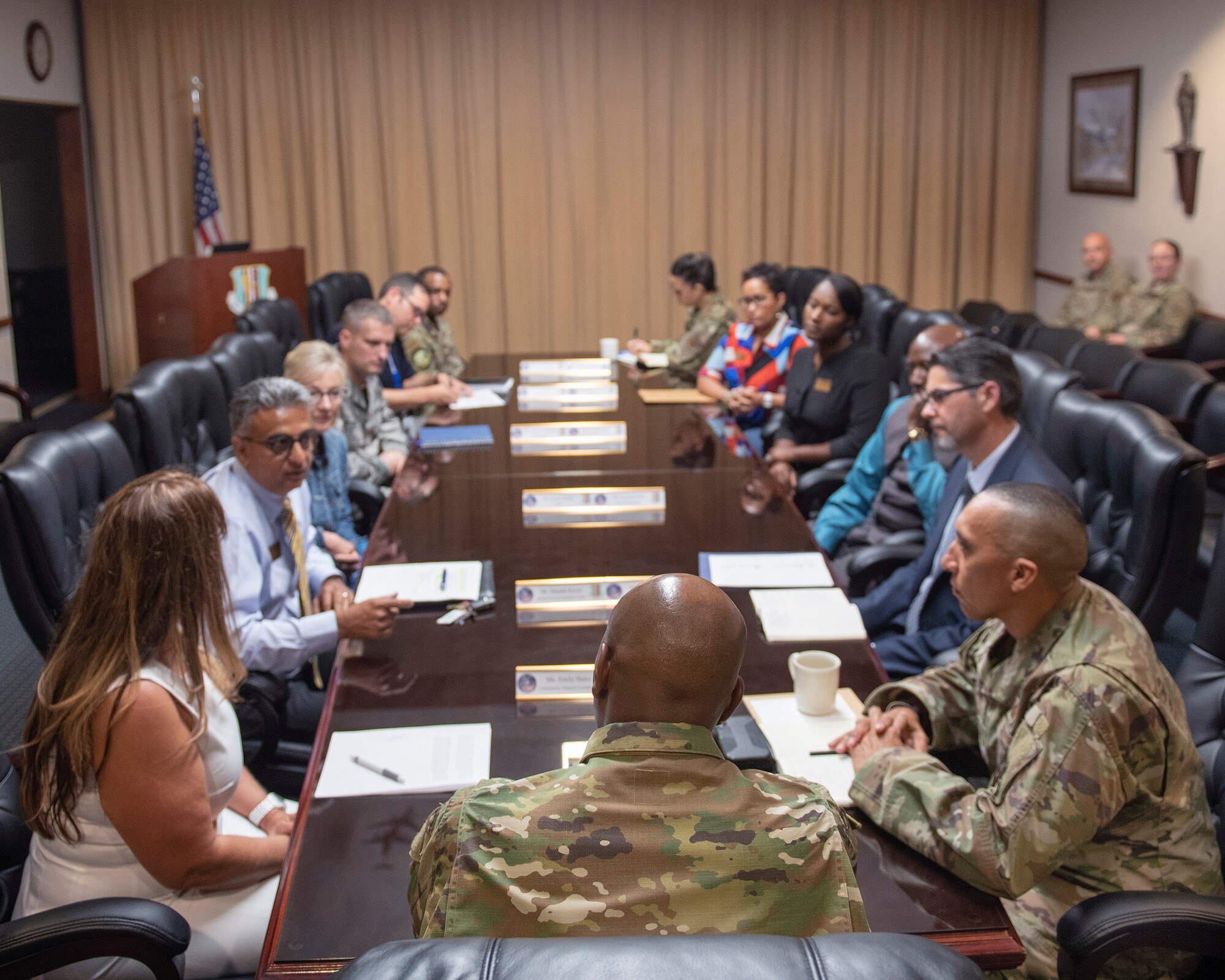 Chief Master Sgt. of the Air Force Kaleth O. Wright attends a briefing from the Travis Air Force Base Care Team