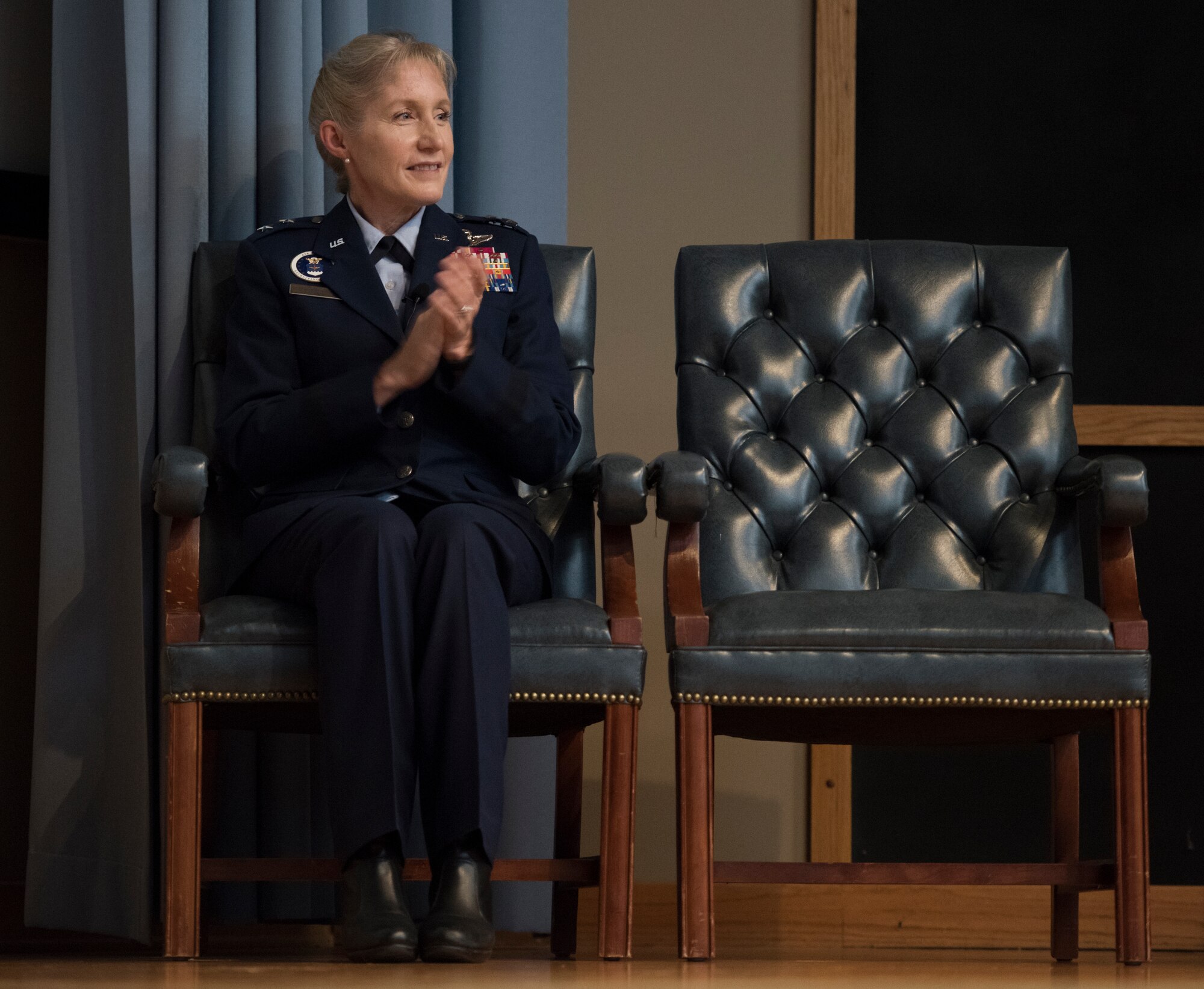 Maj. Gen. Jeannie Leavitt, Air Force Recruiting Service commander, gives a round of applause during Specialized Undergraduate Pilot Training class 19-25’s graduation ceremony at Laughlin Air Force Base, Texas, Spet. 27, 2019. Leavitt, a Laughlin SUPT graduate herself, sports a career of firsts: she was the U.S. Air Force’s first female fighter pilot, first female graduate and instructor of the USAF Weapons School, the first female fighter wing commander, the first female wing commander at Nellis Air Force Base, Nevada. (U.S. Air Force photo by Staff Sgt. Benjamin N. Valmoja)