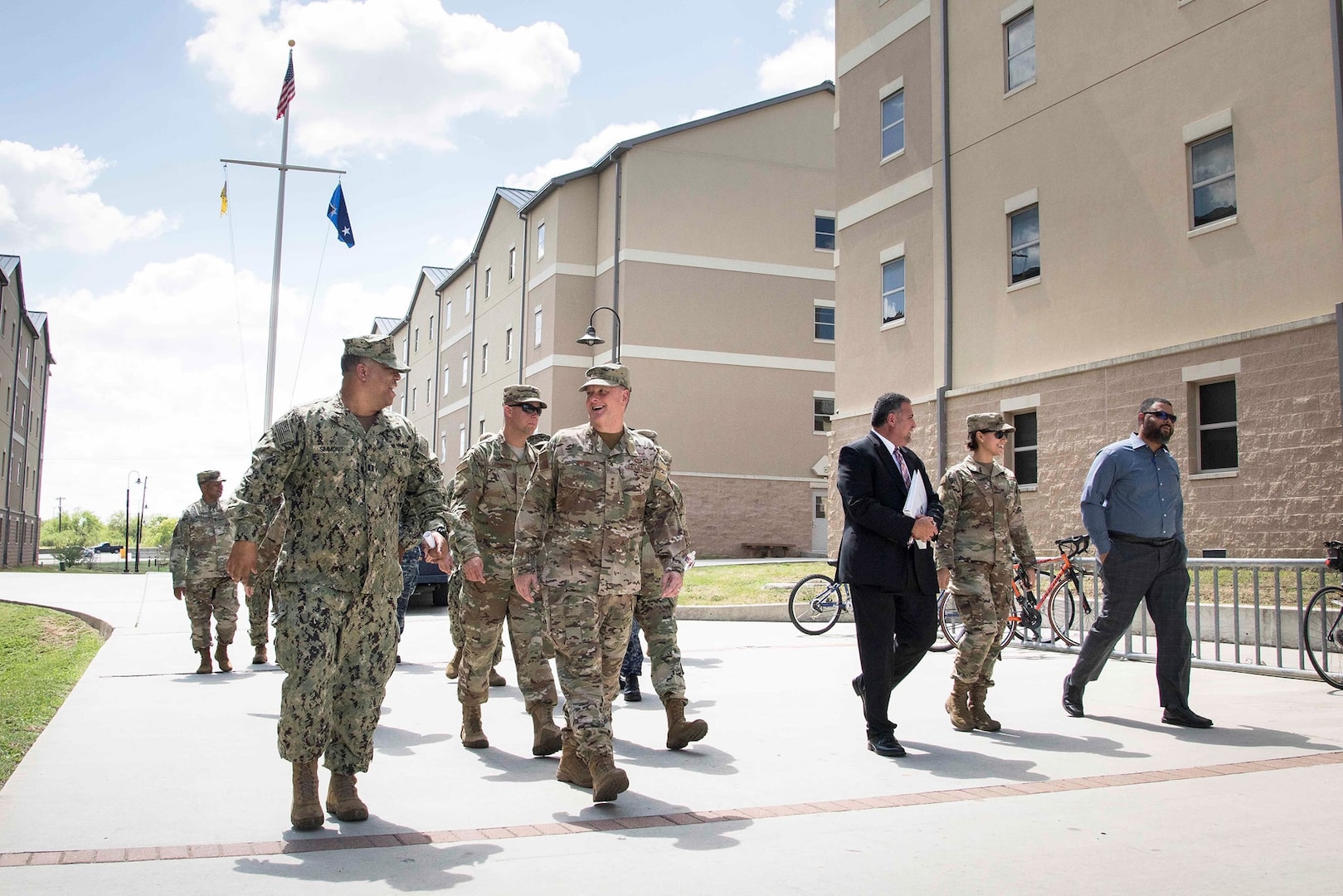 U.S. Navy Lt. LaMont Simmons, Navy Medicine Training Support Center facilities manager, briefs U.S. Air Force Lt. Gen. Brad Webb, commander of Air Education and Training Command, on the cultural difference between the services management of dormitories, Sept. 26, 2019, at Joint Base San Antonio-Fort Sam Houston, Texas. The AETC command team visited some of the 502nd ABW’s 49 installation support functions, and 266 mission partners that enabling the largest Joint Base in DoD to support 80,000 personnel and local community of more than 250,000 retirees. (U.S. Air Force photo by Sean M. Worrell)