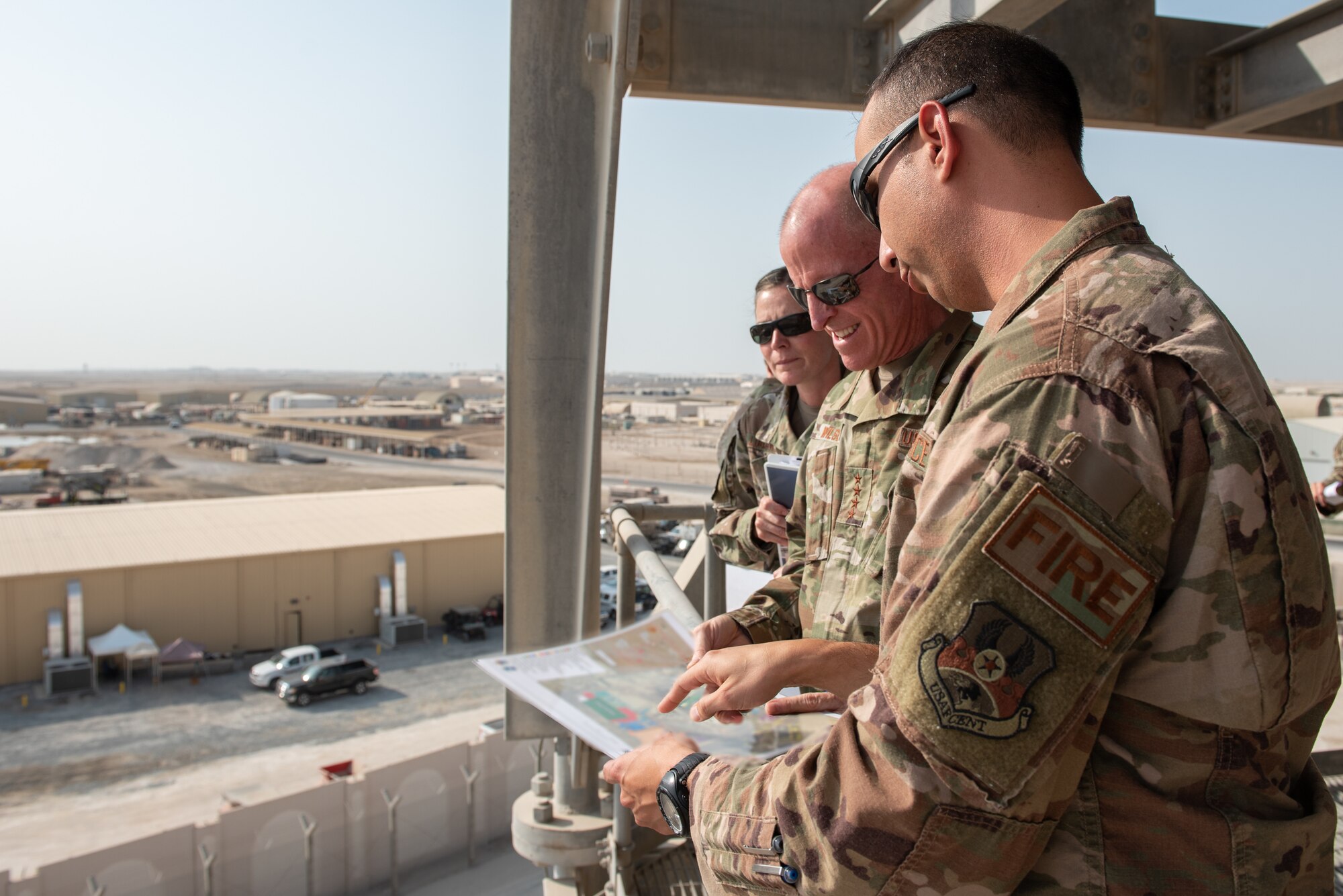 Air Force Vice Chief of Staff Gen. Stephen Wilson receives a briefing from Lt. Col. Ferdinand Maldonado, 380th Expeditionary Civil Engineer Squadron commander, at Radar Alpha Sept. 27, 2019 at Al Dhafra Air Base, United Arab Emirates. Maldonado provided an overview of the U.S. Development Area project, which will bring the infrastructure at ADAB from an expeditionary to enduring presence in the next five to eight years. (U.S. Air Force photo by Staff Sgt. Chris Thornbury)