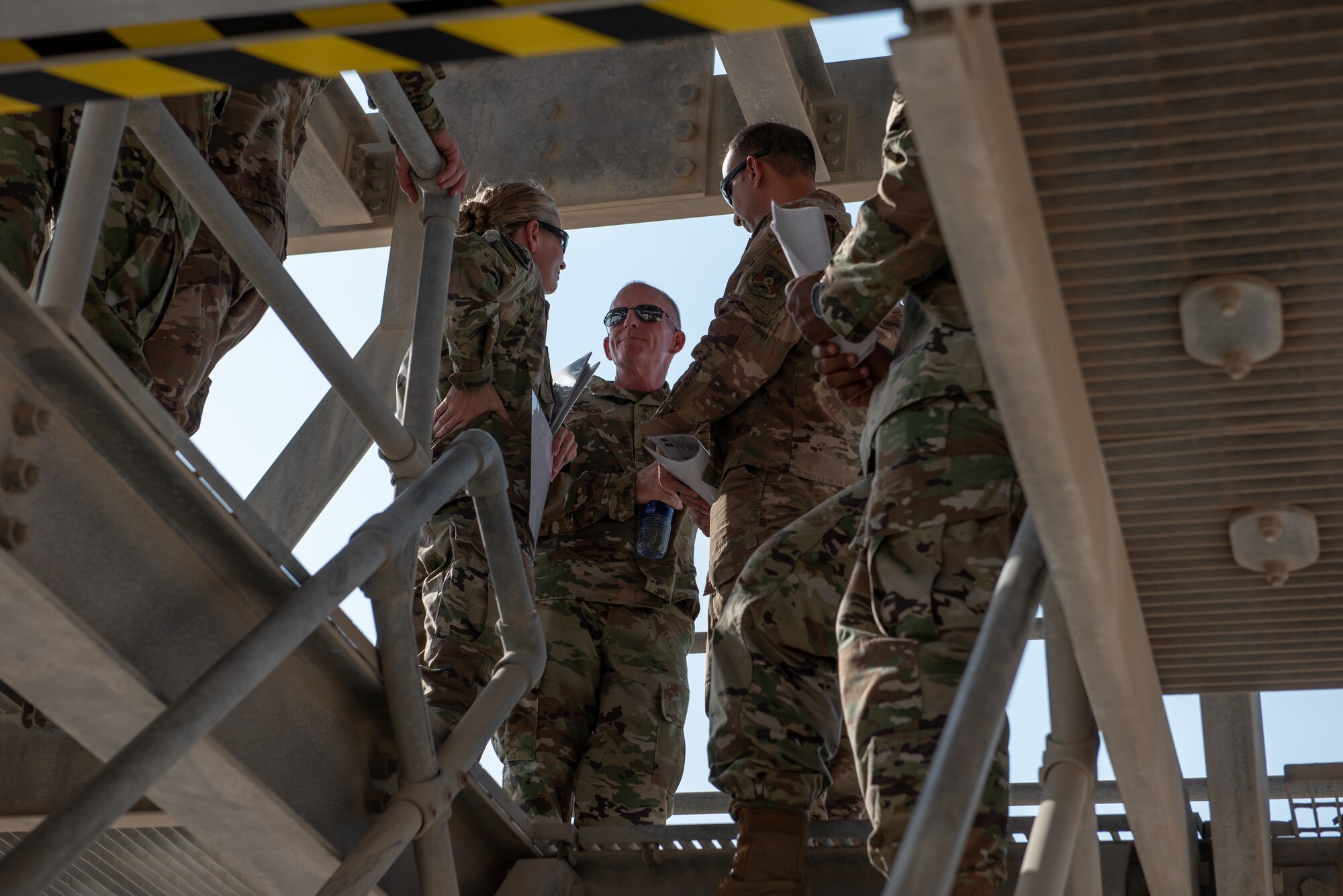 Air Force Vice Chief of Staff Gen. Stephen Wilson talks with group and squadron commanders about the U.S. Development Area project Sept. 27, 2019 at Al Dhafra Air Base, United Arab Emirates. The USDA is a U.S. designed and Host Nation funded project to construct new operations, maintenance, and life support facilities within the next eight years, improving the enduring infrastructure for ADAB. (U.S. Air Force photo by Staff Sgt. Chris Thornbury)