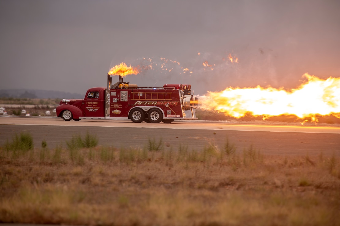 Aftershock, a jet powered firetruck,  races down the flight line at the 2019 Marine Corps Air Station Miramar Air Show on MCAS Miramar, Calif., Sept. 27. This year's air show honors first responders by featuring several performances and displays that highlight first responders and their accomplashments.