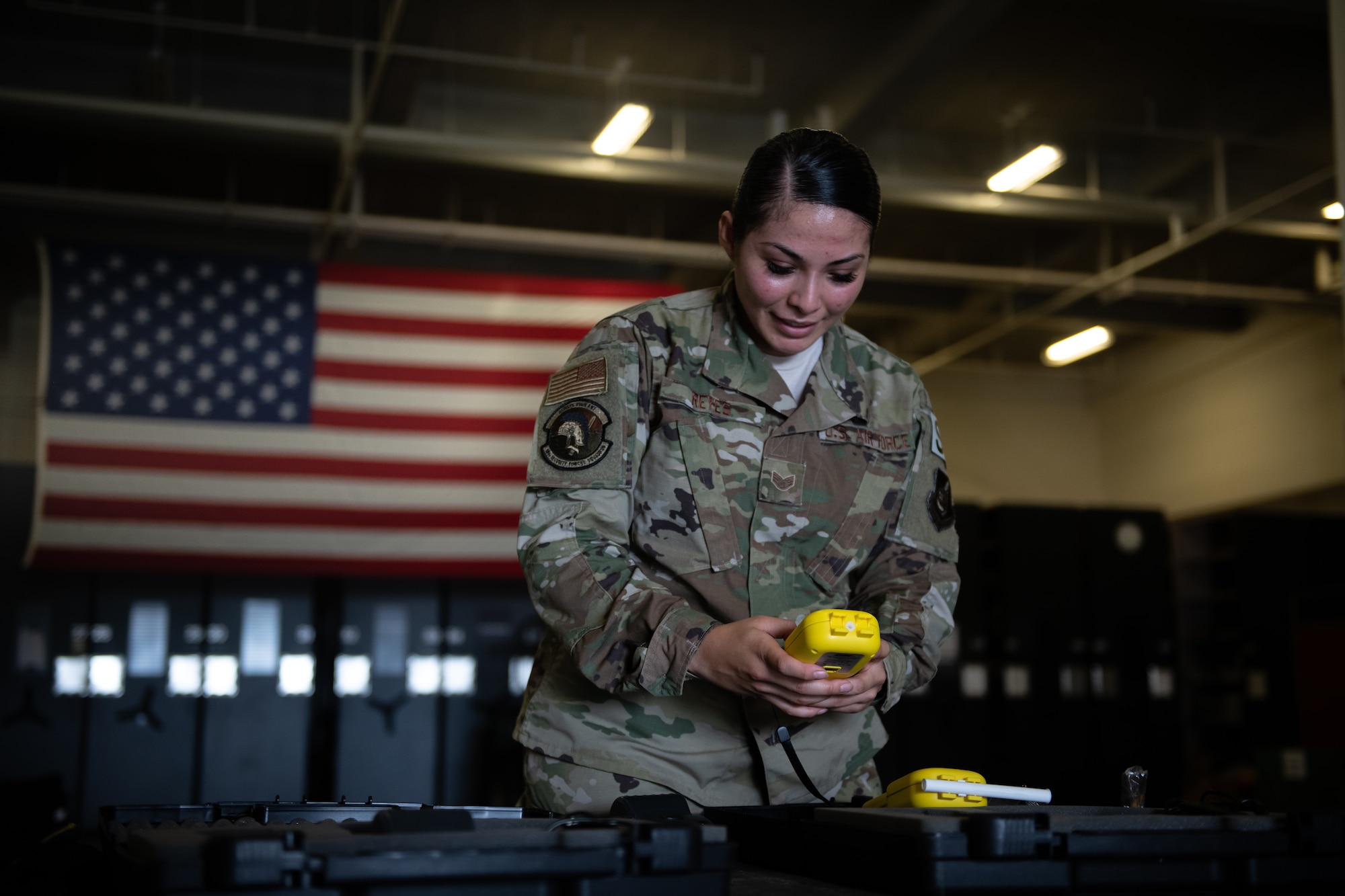 U.S. Air Force Staff Sgt. Jessica Reyes, 18th Security Forces Squadron police services craftsman, prepares breathalyzer equipment during Air Force Immersion Day, Sept. 23, 2019, at Kadena Air Base, Japan. Air Force Immersion Day is a new community engagement program hosted by the base to teach college and vocational students about the 18th Wing’s role in supporting and defending U.S. and Japanese alliance. (U.S. Air Force photo by Staff Sgt. Micaiah Anthony)