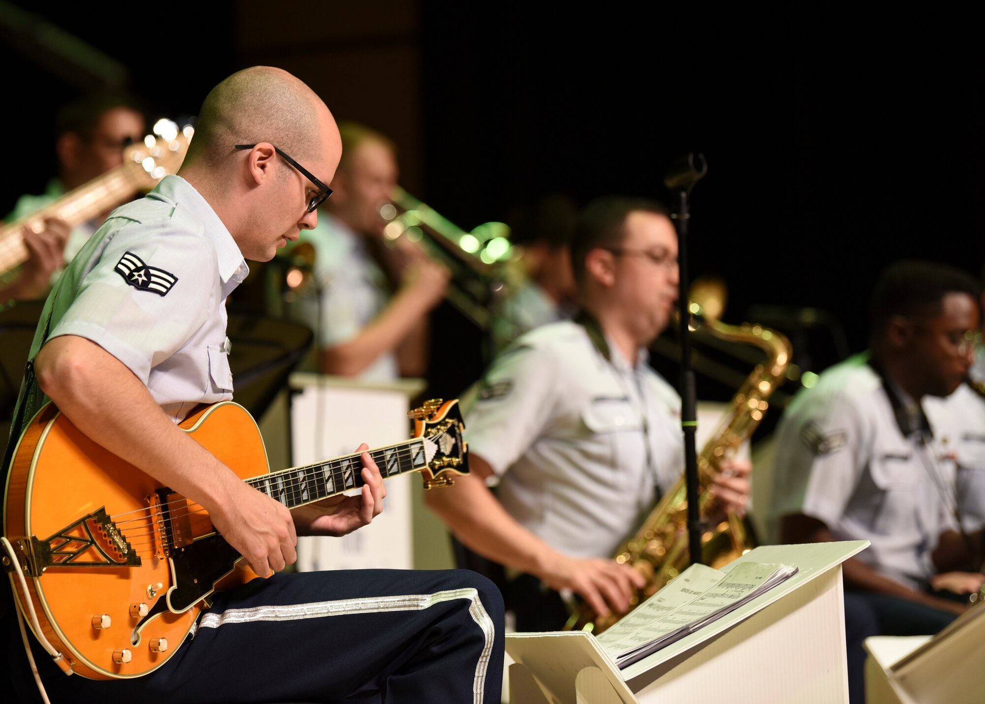 U.S. Air Force Senior Airman Pete Somerville, U.S. Air Force Band of the Pacific guitarist, plays for the Gunsan City’s Chamber of Commerce at the Dongwoo Concert Hall in Gunsan City, Republic of Korea, Sept. 26, 2019. The band performed in India, Mongolia and Thailand earlier this year and will play shows in Japan and Guam later this year. (U.S. Air Force photo by Staff Sgt. Anthony Hetlage)