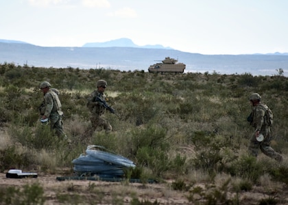 U.S. Combat Engineer Soldiers in Alpha and Bravo Companies, 236th Brigade Engineer Battalion, 30th Armored Brigade Combat Team, North Carolina Army National Guard, conduct engineer qualification table VI, which includes M2 Bradley live fire and breaching an obstacle, on a training range near Fort Bliss, Texas, Sept. 26, 2019.