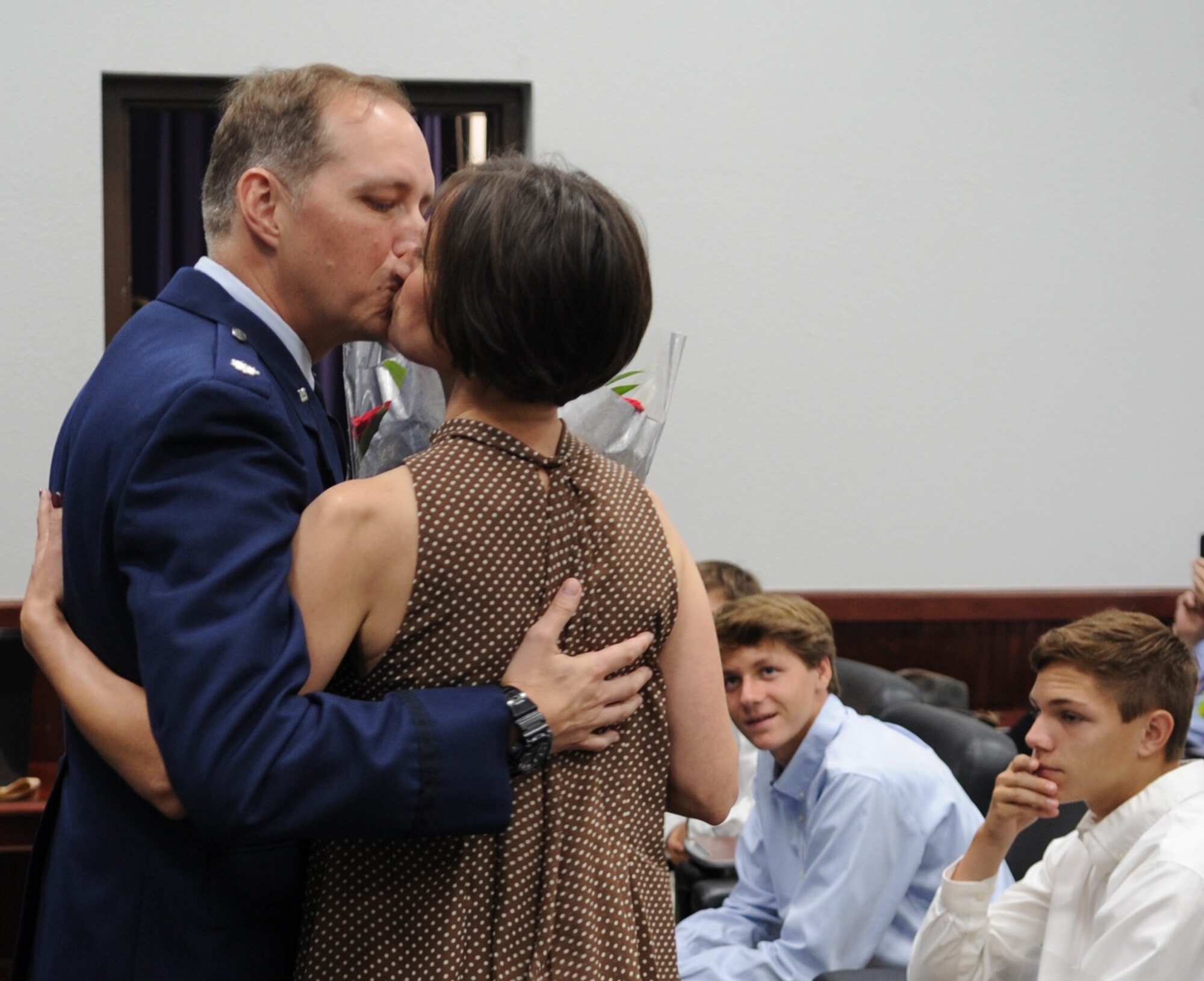 Lt. Col. Timothy Chapman, former 340th Flying Training Group Reserve Undergraduate Flying Training Program manager, thanks his wife, Christa, for her love and support throughout his career during Chapman's Aug. 29 retirement ceremony at Joint Base San Antonio-Randolph, Texas. (U.S. Air Force photo by Debbie Gildea)