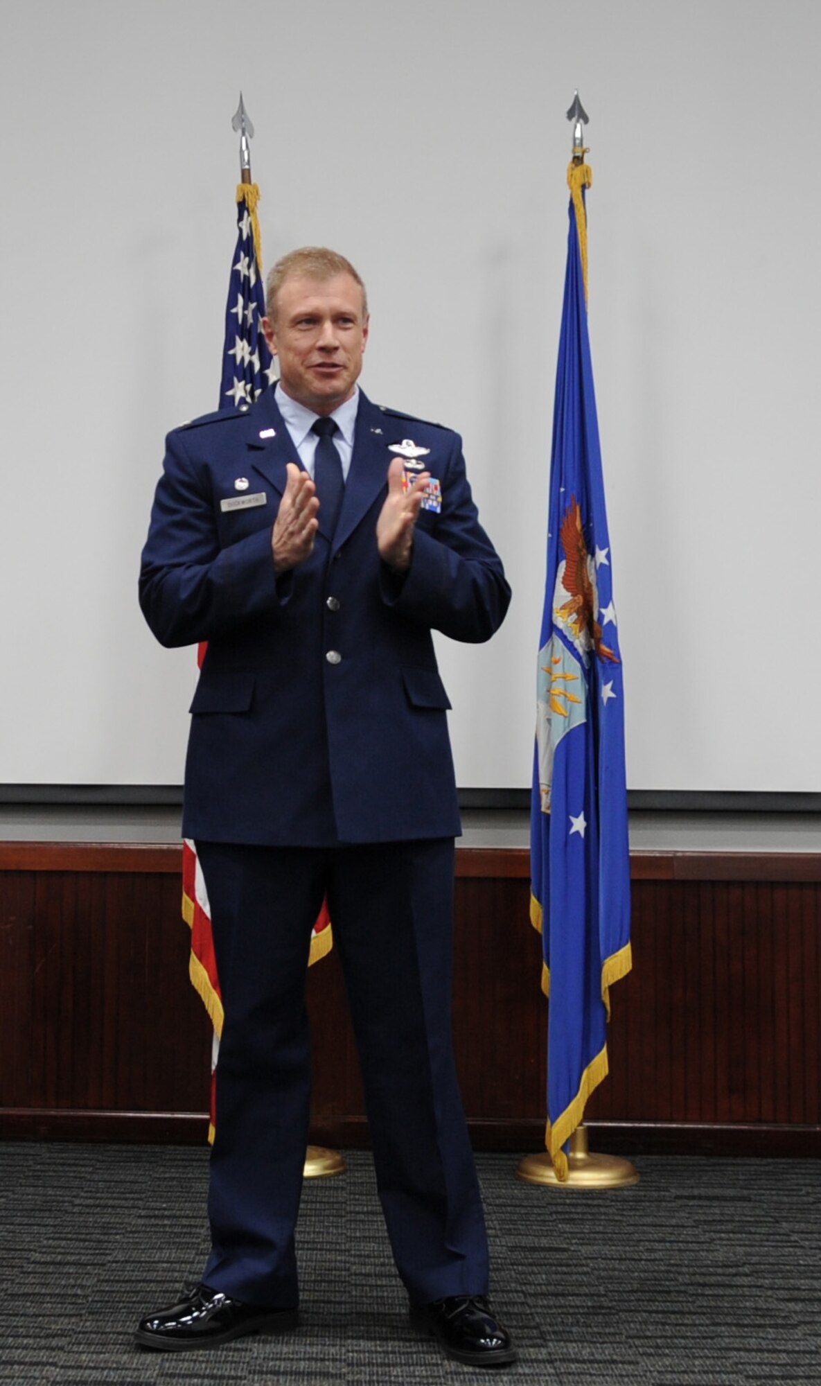 340th Flying Training Group Commander Col. Allen Duckworth makes opening comments during the Aug. 29 retirement ceremony at Joint Base San Antonio-Randolph, Texas for Lt. Col. Timothy Chapman, former 340th FTG Reserve Undergraduate Flying Training Program manager.  (U.S. Air Force photo by Debbie Gildea)