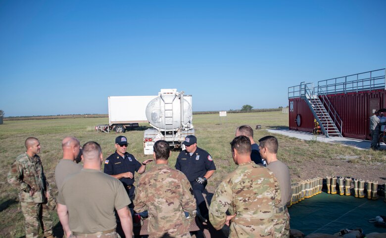 Philip Fourroux, 97th Civil Engineer Squadron fire chief, explains the rules and precautions of the Group Commander and Superintendents Challenge,