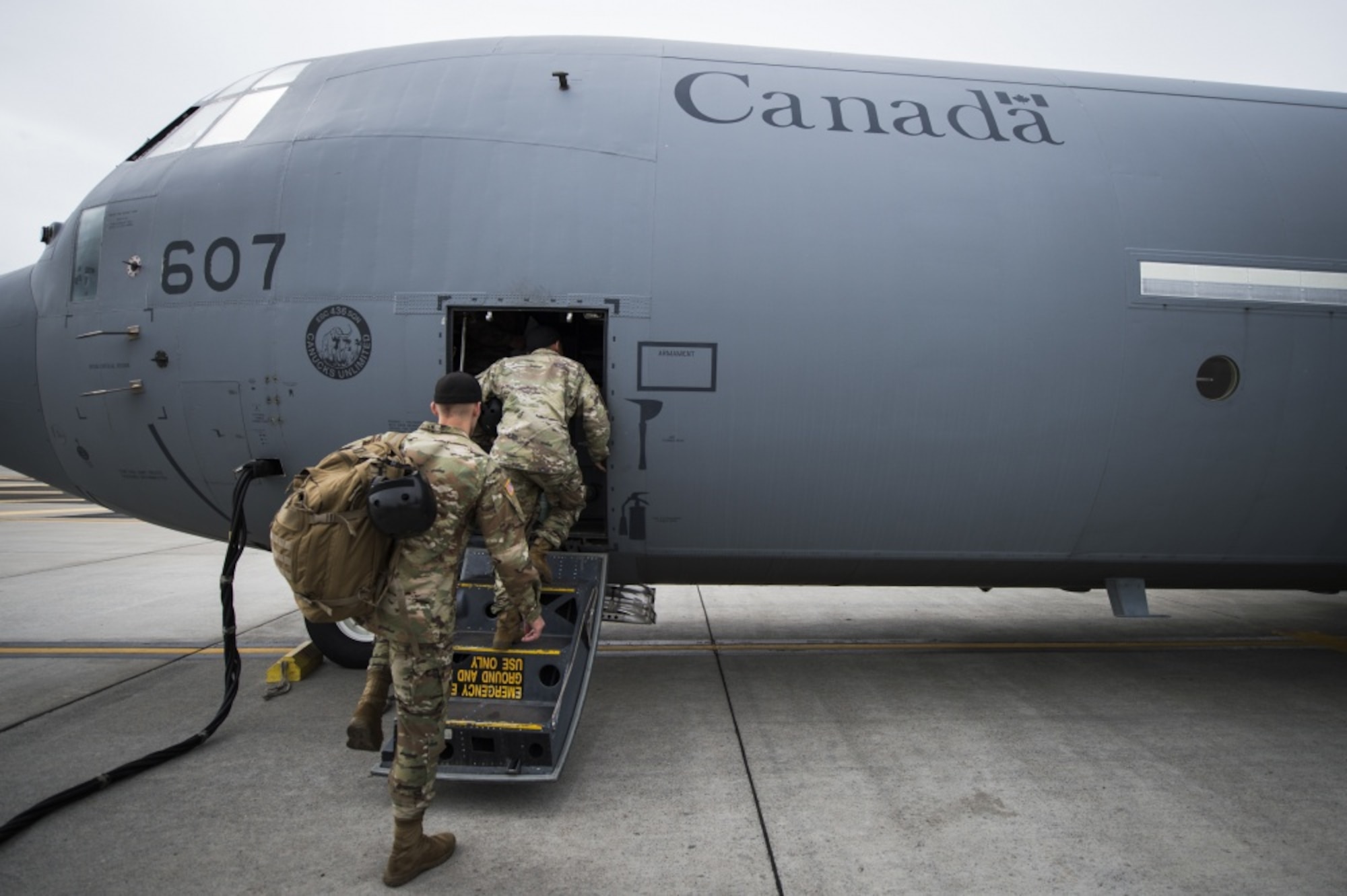 U.S. Army Soldiers board a Royal Canadian Air Force CC-130J Super Hercules, 436 Transport Squadron, assigned to 8 Wing Trenton, Trenton, Ontario, Canada, for the Selah Creek air base opening training scenario during Mobility Guardian 2019, Fairchild Air Force Base, Washington, Sept. 14, 2019. Exercise Mobility Guardian is Air Mobility Command's premier, large scale mobility exercise. Through robust and relevant training, Mobility Guardian improves the readiness and capabilities of Mobility Airmen to deliver rapid global mobility and builds a more lethal and ready Air Force. (U.S. Air Force photo by Tech. Sgt. Larry E. Reid Jr.)