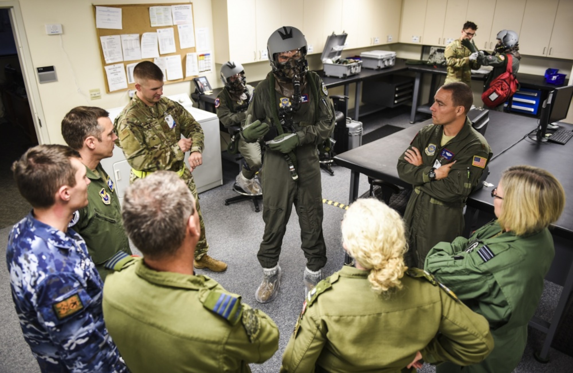 U.S. Air Force Lt. Col Kevin Parsons, center, 93rd Air Refueling Squadron commander assigned to Fairchild Air Force Base, Washington, briefs international partners before a flight Sept. 16, 2019, at Fairchild AFB during Exercise Mobility Guardian 2019. Exercise Mobility Guardian is Air Mobility Command's premier, large scale mobility exercise. Through robust and relevant training, Mobility Guardian improves the readiness and capabilities of Mobility Airmen to deliver rapid global mobility and builds a more lethal and ready Air Force. (U.S. Air Force photo by Staff Sgt. Dustin Mullen)