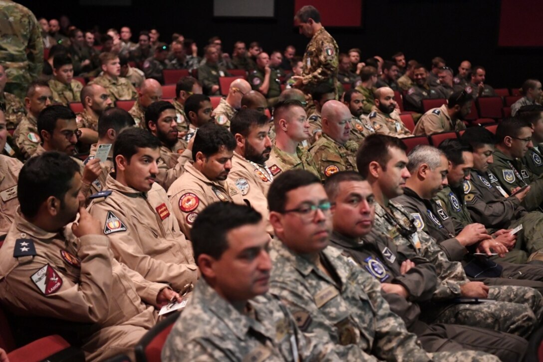 Airmen from the United Arab Emirates participate in an Exercise Mobility Guardian Phase III briefing at Fairchild Air Force Base, Washington. The final phase of Mobility Guardian includes more two dozen international partners training alongside U.S. forces in order to learn each other’s procedures and best practices. Exercise Mobility Guardian is Air Mobility Command's premier, large scale mobility exercise. Through robust and relevant training, Mobility Guardian improves the readiness and capabilities of Mobility Airmen to deliver rapid global mobility and builds a more lethal and ready Air Force. (U.S. Air Force photo by Tech. Sgt. Luther Mitchell)