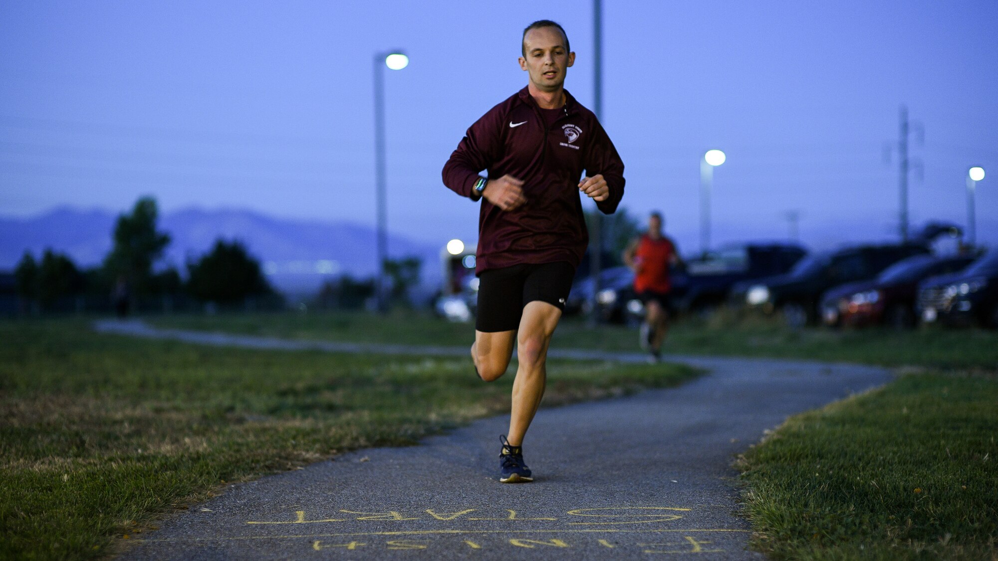 A runner nears the finish line during a Suicide Prevention Month 5K ruck march/run at Hill Air Force Base, Utah, Sept. 25, 2019. (U.S. Air Force photo by R. Nial Bradshaw)