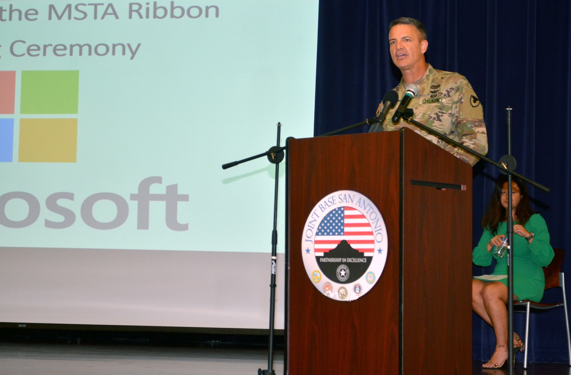 Col. Peter Velesky, Joint Base San Antonio and 502nd Air Base Wing deputy commander, delivers remarks at a ribbon-cutting ceremony for the establishment of the Microsoft Military Spouse Technology Academy program in San Antonio at the JBSA-Fort Sam Houston Military & Family Readiness Center Sept. 27. Velesky spoke about the positive impact the training program will have for military spouses who are seeking a career in the technology field.