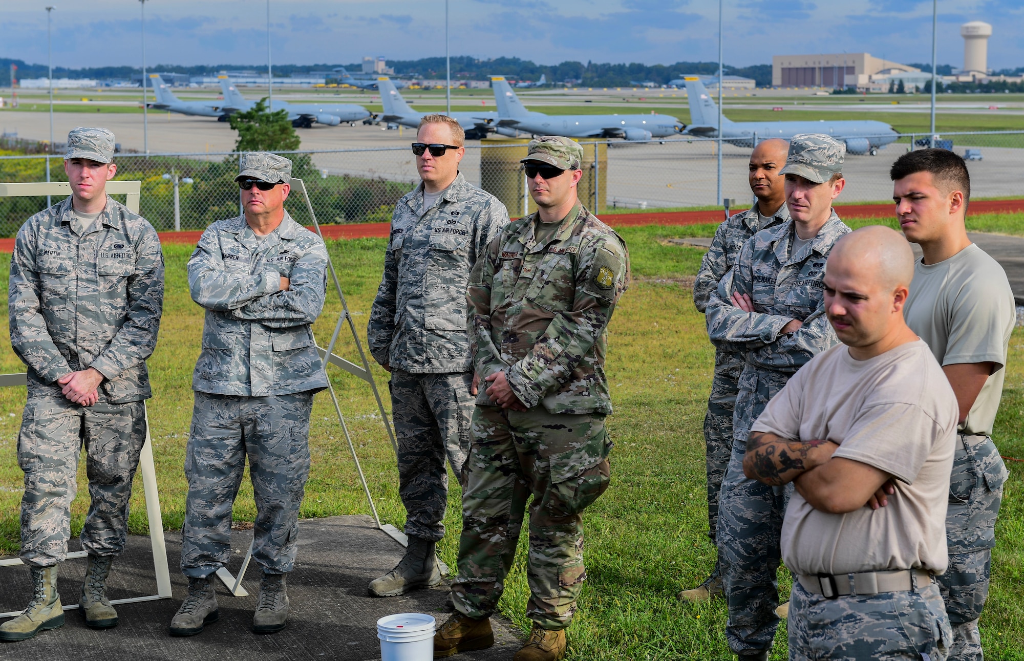 Members of the 911th Airlift Wing and the 171st Air Refueling Wing listen to instructions for a joint decontamination exercise in Coraopolis, Pennsylvania, September 8, 2019.