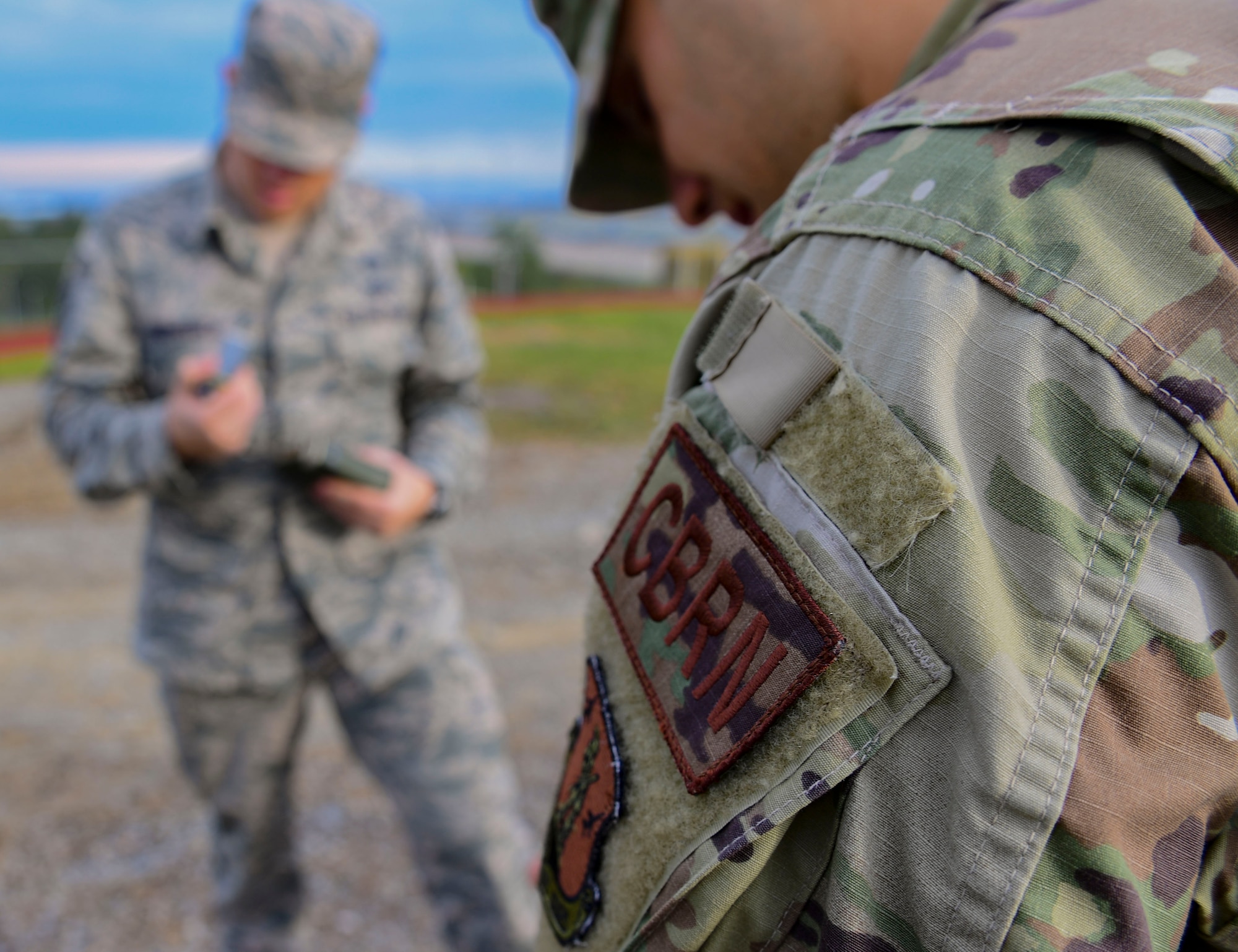 Tech. Sgt. Brian Vermeesch, foreman for the 911th Civil Engineer Squadron, and Senior Airman Phil Kapelewski of the 171st Civil Engineer Squadron, set up equipment for a joint decontamination exercise in Coraopolis, Pennsylvania, September 8, 2019.