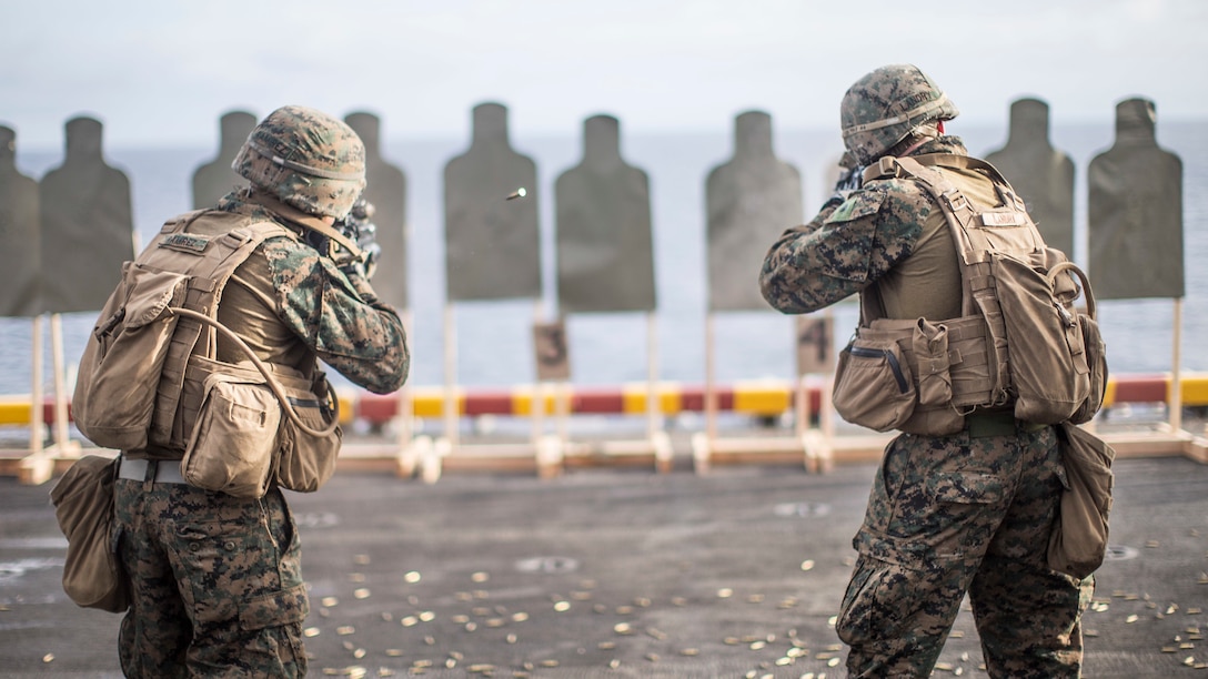 U.S. Marines with Lima Company,  Battalion Landing Team 3/5, 11th Marine Expeditionary Unit, fire at targets during a live-fire range aboard the amphibious assault ship USS Boxer. The Marines and Sailors of the 11th MEU are deployed to the U.S. 7th Fleet area of operations to support regional stability, reassure partners and allies, and maintain a presence postured to respond to any crisis ranging from humanitarian assistance to contingency operations.