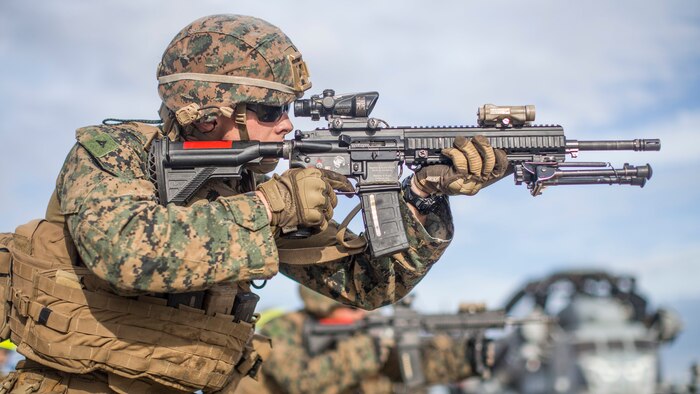U.S. Marine Corps Lance Cpl. Logan Campbell, a rifleman with Lima Company,  Battalion Landing Team 3/5, 11th Marine Expeditionary Unit, fires an M27 Infantry Automatic Rifle during a live-fire range aboard the amphibious assault ship USS Boxer. The Marines and Sailors of the 11th MEU are deployed to the U.S. 7th Fleet area of operations to support regional stability, reassure partners and allies, and maintain a presence postured to respond to any crisis ranging from humanitarian assistance to contingency operations.