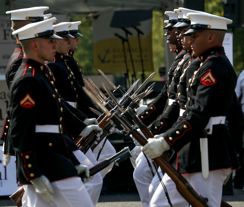 Marines with the U.S. Marine Corps Silent Drill Platoon perform during the 2019 Barracks Row Fall Festival in Washington, D.C., Sept. 28, 2019. The annual festival brings the community together to celebrate its rich history and support local venues. (U.S. Marine Corps photo by Sgt. Robert Knapp)