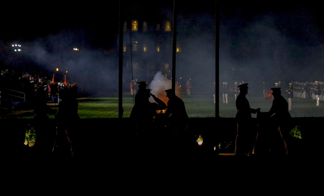 Marine Corps Body Bearers, Bravo Company, Marine Barracks Washington D.C., fire cannons during a retirement ceremony for Gen. Thomas D. Waldhauser, commander, U.S. Africa Command, at Marine Barracks Washington, D.C., Sept 27, 2019. General Waldhauser served as an infantry officer at all levels in the Corps, including command of the 15th Marine Expeditionary Unit (Special Operations Capable) during combat operations in Afghanistan and Iraq. His General Officer commands included the Marine Corps Warfighting Laboratory, 1st Marine Division, I Marine Expeditionary Force, and Commander, Marine Corps Forces Central Command. He retired after more than 43 years of dedicated and faithful service to our Corps. (U.S. Marine Corps photo by Sgt. Robert Knapp)