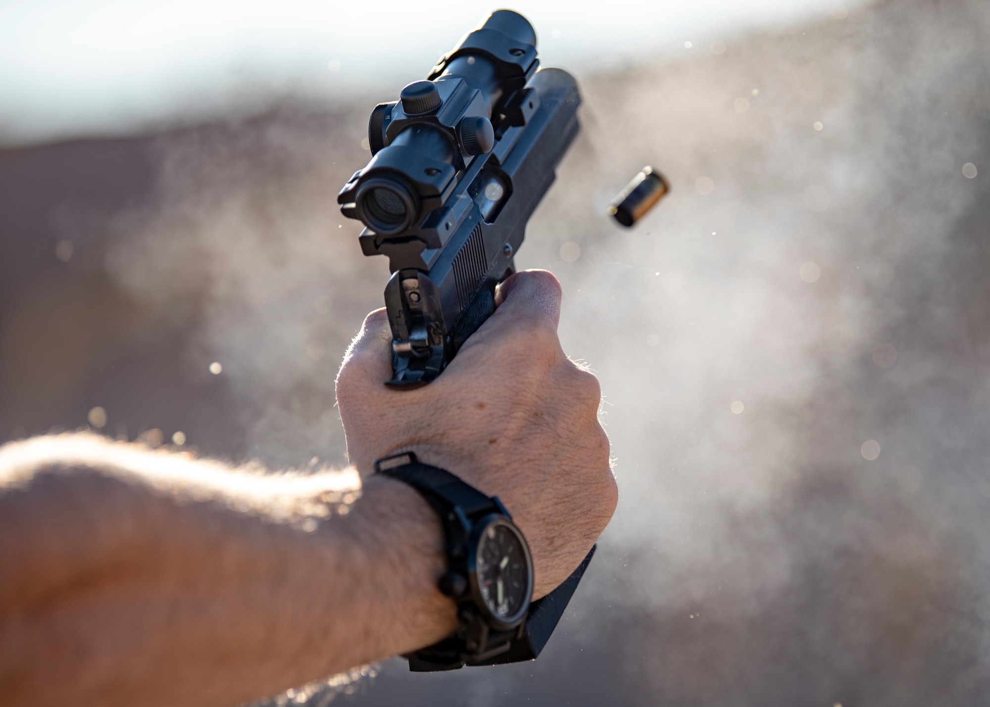 A pistol is fired.