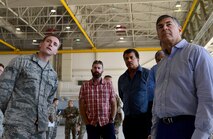 Members of the Defense Innovation Board (DIB), Defense Innovation Unit (DIU) and Defense Digital Services (DDS) receive a brief from an Airman at an MQ-9 Reaper display at Creech Air Force Base, Nevada, Sept. 12, 2019. The group is made up of prominent business leaders, scholars, inventors, and scientists such as the director of the Hayden Planetarium, Neil Degrasse Tyson. (U.S. Air Force photo by Senior Airman Haley Stevens)