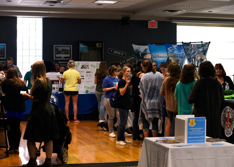Spouses network and mingle before the Spouses Town Hall Social began at the event center on Goodfellow Air Force Base, Texas, Sept. 26, 2019. The town hall offered spouses a chance to ask Goodfellow leadership about concerns that they had. (U.S. Air Force photo by Airman 1st Class Zachary Chapman/Released)
