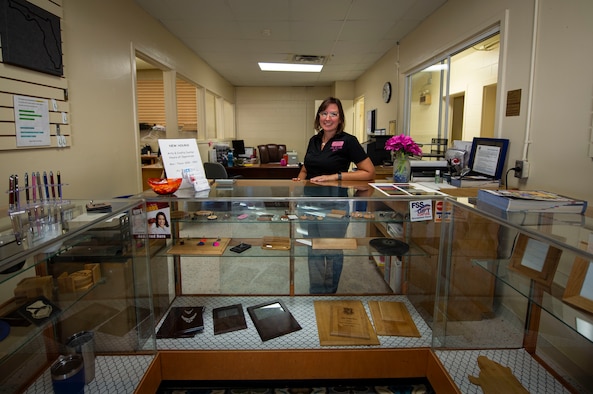 Vikki Dalton, 325th Force Support Squadron Arts and Crafts Center manager, stands at the front desk of the Arts and Crafts Center on Tyndall Air Force Base, Fla., Sept. 24, 2019. The Arts and Crafts Center offers a wide varies of personalized items and crafty classes. (U.S. Air Force photo by Airman 1st Class Bailee A. Darbasie)
