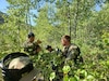 2nd Lt. Carter briefs adjustments to the plan at the Objective Rally Point (ORP) in preparation for field interrogations, during a training exercise in Cache Valley National Forest, August 11, 2019.