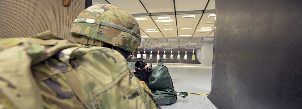 U.S. Army Paratrooper assigned to the 173rd Brigade Support Battalion, 173rd Airborne Brigade, fires an M4 carbine in the prone during marksmanship training at the indoor range Caserma Del Din, Vicenza, Italy, Dec. 3, 2019. The 173rd Airborne Brigade is the U.S. Army Contingency Response Force in Europe, capable of projecting ready forces anywhere in the U.S. European, Africa or Central Commands' areas of responsibility. (U.S. Army photo by Davide Dalla Massara)