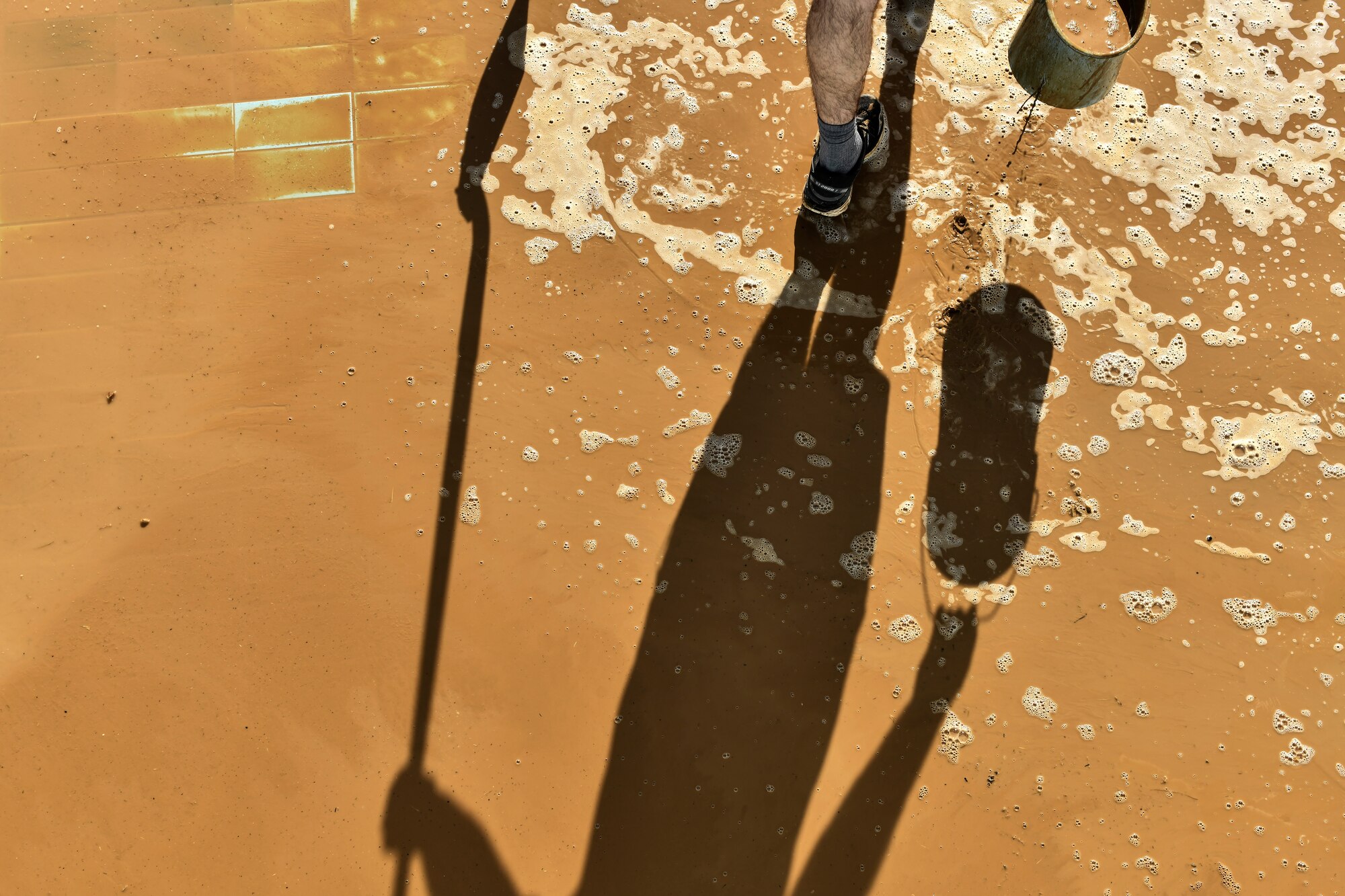 Airmen cleaning pools