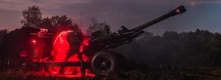 U.S. Army paratroopers assigned to Second Platoon, Alpha Battery, 4-319th Airborne Field Artillery Regiment (AFAR), 173rd Airborne Brigade, fire 105mm artillery rounds with an M119A3 Howitzer during Exercise Saber Junction at Grafenwoehr Training Area, Germany, Sept. 11, 2019.
(U.S. Army photo by Sgt. Henry Villarama)