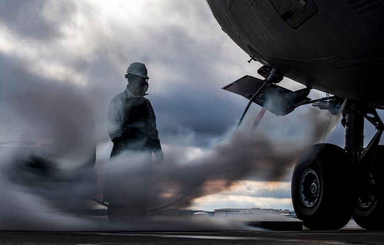 Senior Airman Zachary Anderson, 911th Aircraft Maintenance Squadron crew chief, observes excess liquid oxygen bleed-out from a C-17 Globemaster III at the Pittsburgh International Airport Air Reserve Station, Pennsylvania, March 10, 2020.
