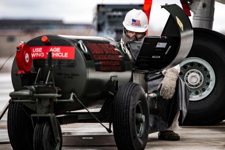 Senior Airman Zachary Anderson, 911th Aircraft Maintenance Squadron crew chief, prepares to service the liquid oxygen of a C-17 Globemaster III at the Pittsburgh International Airport Air Reserve Station, Pennsylvania, March 10, 2020.