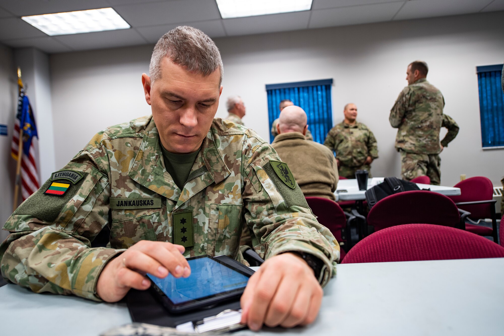 A Lithuanian military logistics officer reviews planning notes use during the National Guard Bureau’s Northern Strike Exercise Planning Conference at the Pittsburgh International Airport Air Reserve Station, Pennsylvania, Feb. 11, 2020.
