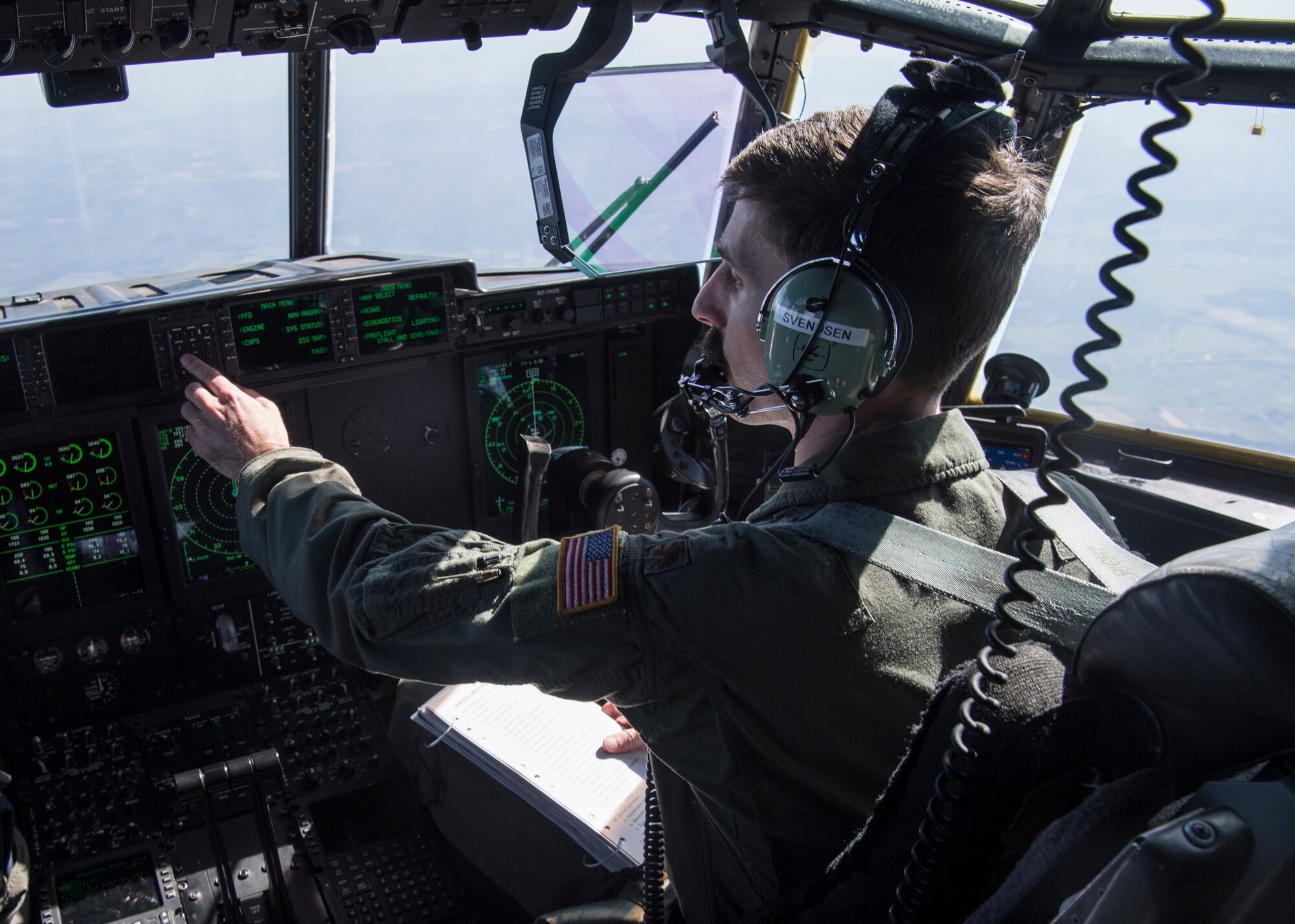 U.S. Air Force Maj. Erik Svendsen, 37th Airlift Squadron pilot, flies a C-130J Super Hercules aircraft over Belgium, March 26, 2020.