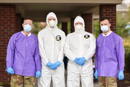 (Left to right) Sgt. Jacob Winton, Cpl. Justin Chambers, Spc. Austin Barnett, Spc. Jason Bahr, at a COVID-19 remote testing site in Putnam County, Tennessee, March 27. At the request of Bill Lee, 250 Soldiers and Airmen from the Tennessee National Guard have volunteered to provide support in response to the COVID-19 pandemic.