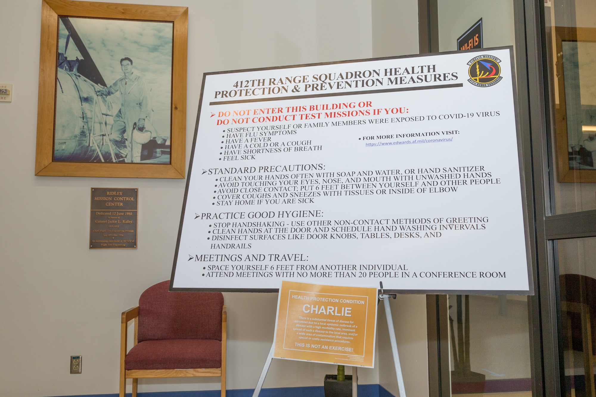 Health protection and prevention measures are displayed inside the Ridley Mission Control Center at Edwards Air Force Base, California, to stem the Coronavirus COVID-19 outbreak and keep the 412th Test Wing mission capable. (Air Force photo by Ethan Wagner)