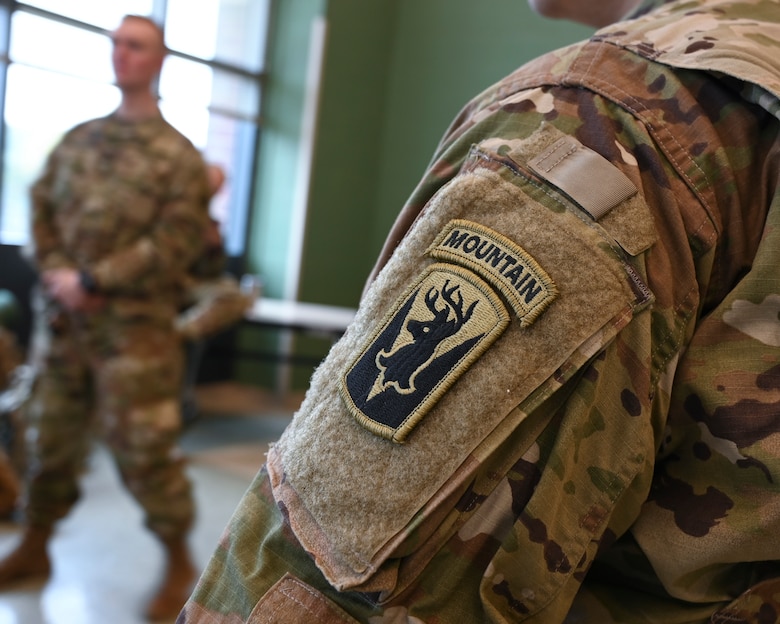 Soldiers assigned to the Connecticut Army National Guard, Bravo Company, 1st Battalion, 102nd Infantry Regiment receive a mission briefing at the Middletown Armed Forces Reserve Center, March 31, 2020, Middletown, Connecticut. The soldiers were placed on State Active Duty orders in response to the COVID-19 pandemic. (U.S. Air National Guard photo by Tech. Sgt. Tamara R. Dabney)