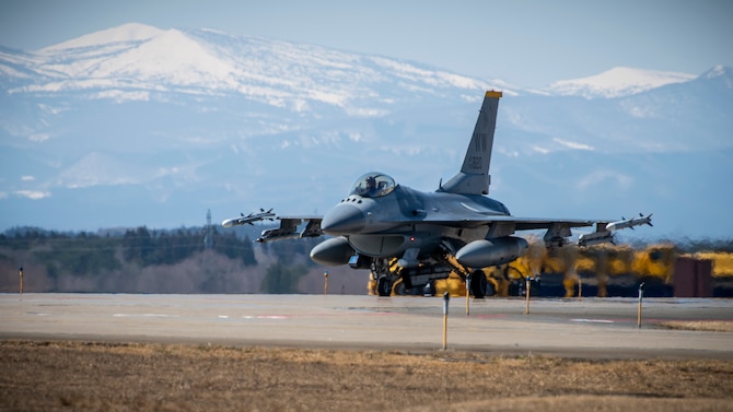 A U.S. Air Force F-16 Fighting Falcon taxis down the runway at Misawa Air Base, Japan, March 30, 2020. In an air-to-surface role, the F-16 can fly more than 500 miles, deliver its weapons with superior accuracy, defend itself against enemy aircraft, and return to its starting point. This F-16 belongs to the 14th Fighter Squadron, assigned to Misawa AB in 1994. Their emblem is the Fighting Samurai. (U.S. Air Force photo by Airman 1st Class China M. Shock)
