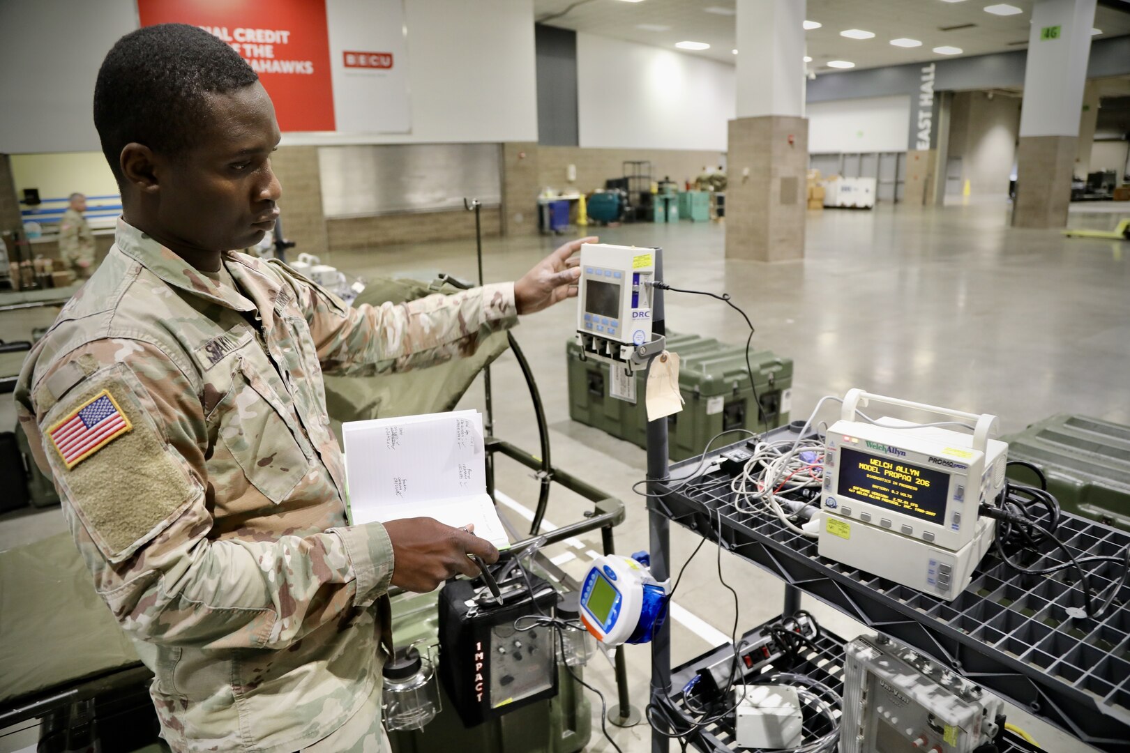 Soldier checks equipment