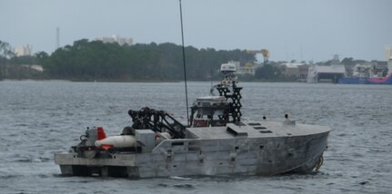 The Mine Countermeasure Unmanned Surface Vehicle project team conducts underway missions in support of contractor testing at the Naval Surface Warfare Center Panama City Division.